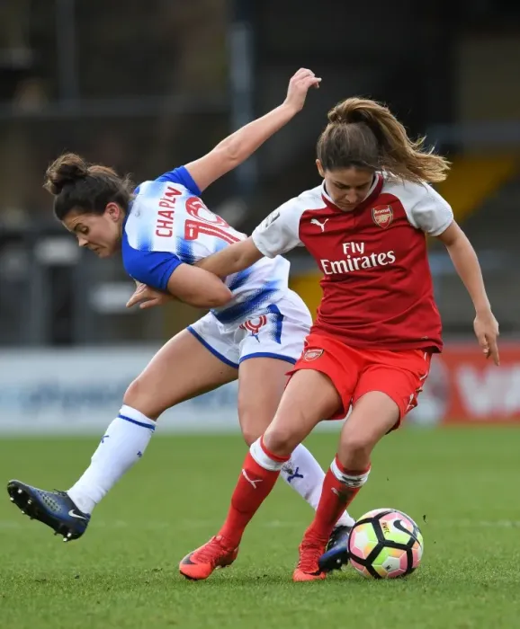 Framed Print : Clash on the Pitch: Danielle van de Donk vs Brooke Chaplen in Women's Super League Match