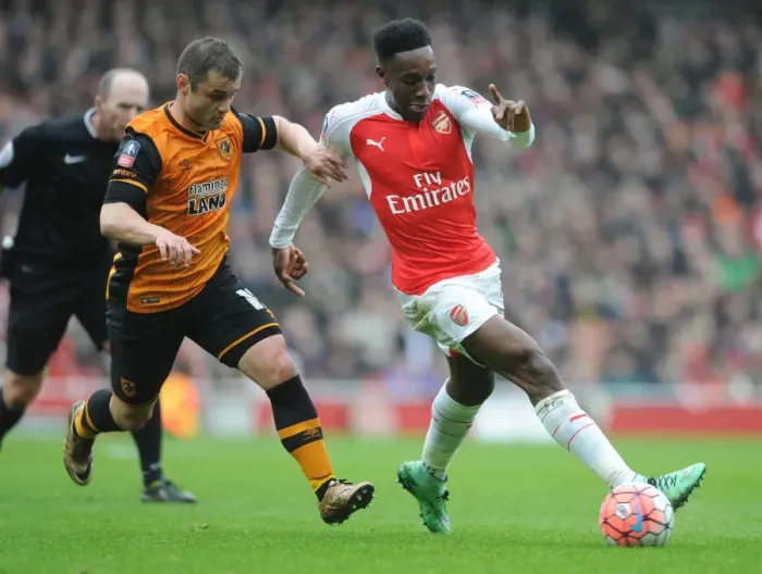 Framed Print : Clash of the Players: Danny Welbeck vs Shaun Maloney in FA Cup Battle at Arsenal's Emirates Stadium