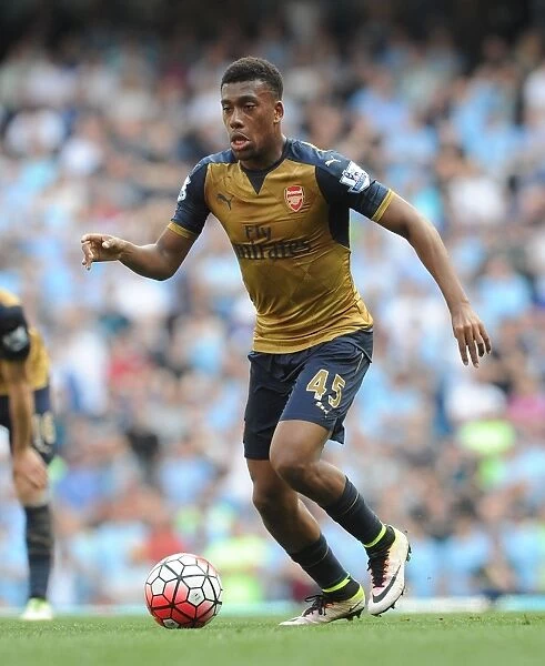 Clash in the Premier League: Alex Iwobi's Determined Performance Against Manchester City (May 2016)