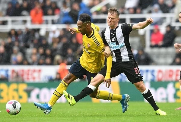 Clash of the Premier League Stars: Aubameyang vs. Ritchie - Arsenal's Star Forward Meets Newcastle's Midfield Maestro