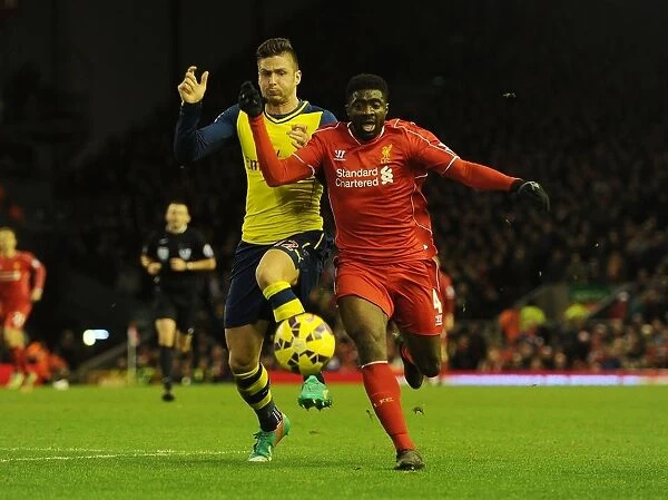 Clash of the Reds: Giroud vs. Toure - A Battle of Arsenal and Liverpool Rivals