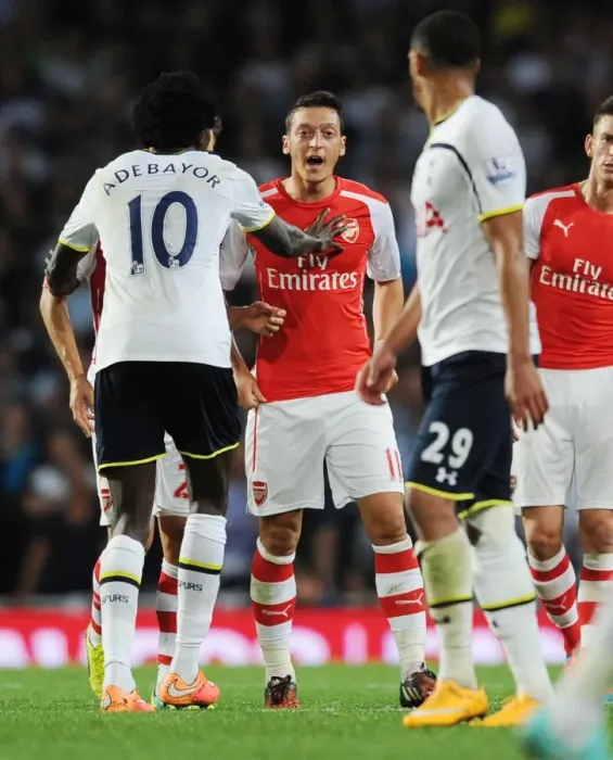 Framed Print : Clash of Rivals: Arsenal vs. Tottenham, Ozil vs. Adebayor Framed Print : Clash of Rivals: Arsenal vs. Tottenham, Ozil vs. Adebayor
