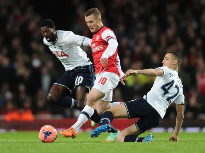 Framed Print : Clash of Rivals: Arsenal vs. Tottenham in the FA Cup Third Round - Battle of the Midfielders
