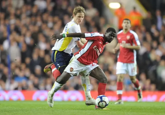 Framed Print : Clash of Rivals: Eboue vs. Pavlyuchenko in the North London Derby