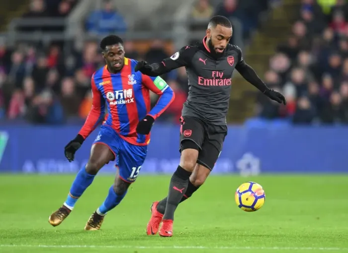 Framed Print : Clash at Selhurst: Lacazette vs Schlupp in Premier League Showdown