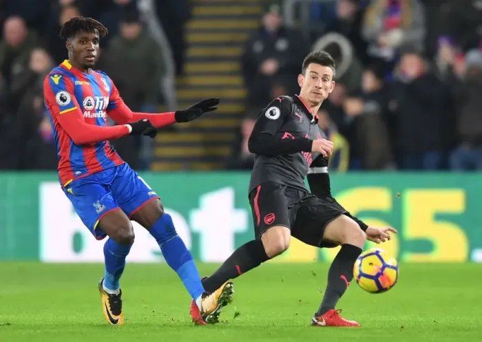 Framed Print : Clash at Selhurst Park: Koscielny vs. Zaha in Premier League Showdown Framed Print : Clash at Selhurst Park: Koscielny vs. Zaha in Premier League Showdown