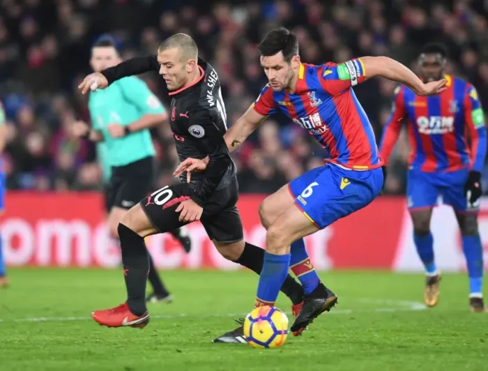 Framed Print : Clash at Selhurst Park: Wilshere vs. Dann in Premier League Battle