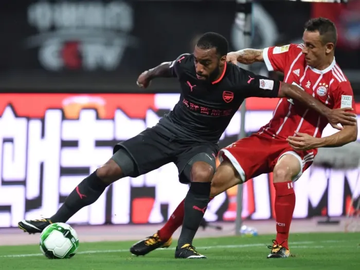 Framed Print : Clash in Shanghai: Lacazette vs Bernat - Bayern Munich vs Arsenal Pre-Season Face-Off Framed Print : Clash in Shanghai: Lacazette vs Bernat - Bayern Munich vs Arsenal Pre-Season Face-Off