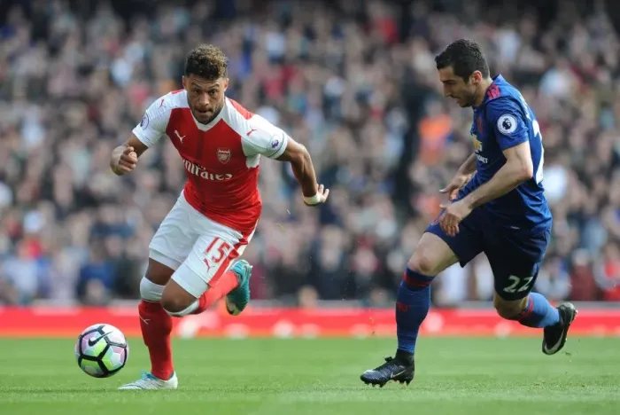 Framed Print : Clash of Skills: Oxlade-Chamberlain vs. Mkhitaryan - Arsenal vs. Manchester United, Premier League 2016-17 Framed Print : Clash of Skills: Oxlade-Chamberlain vs. Mkhitaryan - Arsenal vs. Manchester United, Premier League 2016-17