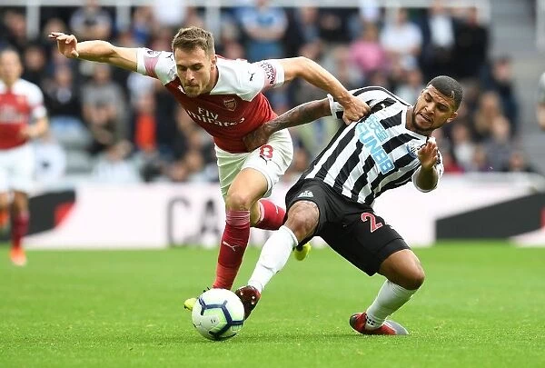 Clash at St. James Park: A Battle Between Ramsey and Kenedy - Arsenal vs. Newcastle United, Premier League 2018 / 19
