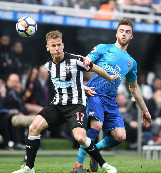 Clash at St. James Park: Chambers vs. Ritchie in Newcastle-Arsenal Premier League Battle