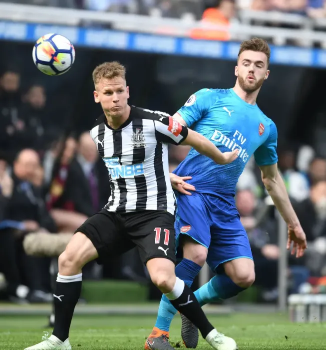 Framed Print : Clash at St. James Park: Chambers vs. Ritchie in Newcastle-Arsenal Premier League Battle Framed Print : Clash at St. James Park: Chambers vs. Ritchie in Newcastle-Arsenal Premier League Battle