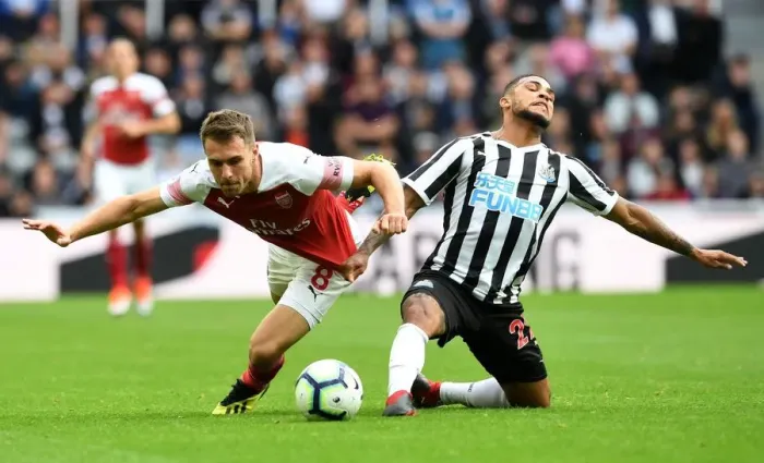 Framed Print : Clash at St. James Park: A Duel Between Ramsey and Kenedy - Arsenal vs. Newcastle United, Premier League 2018-19 Framed Print : Clash at St. James Park: A Duel Between Ramsey and Kenedy - Arsenal vs. Newcastle United, Premier League 2018-19