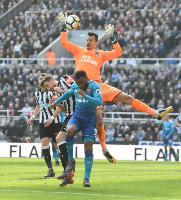 Framed Print : Clash at St. James Park: Lacazette Faces Off Against Dummett and Dubravka (Newcastle vs. Arsenal, Premier League) Framed Print : Clash at St. James Park: Lacazette Faces Off Against Dummett and Dubravka (Newcastle vs. Arsenal, Premier League)