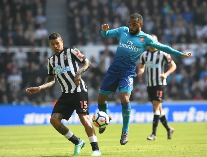 Framed Print : Clash at St. James Park: Lacazette vs. Kenedy - Arsenal vs. Newcastle United, Premier League