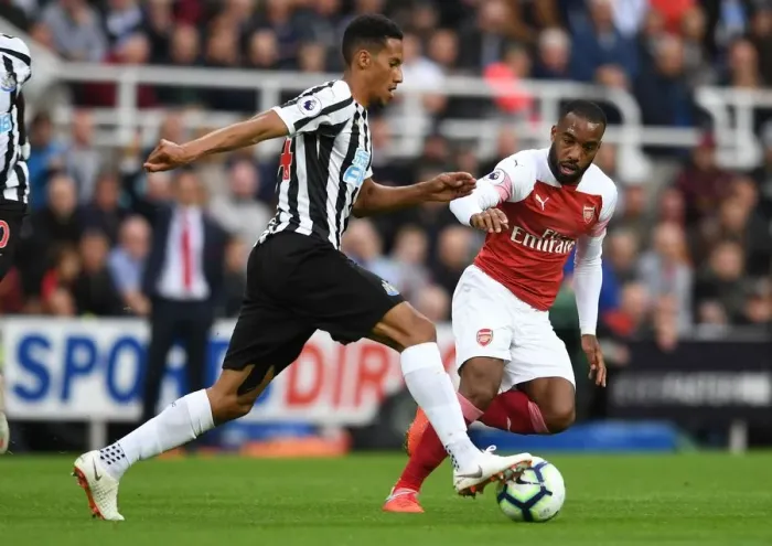 Framed Print : Clash at St. James Park: Lacazette vs. Hayden