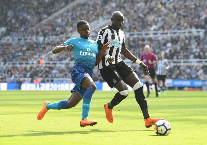 Framed Print : Clash at St. James Park: Nketiah Chases Down Diame in Premier League Showdown