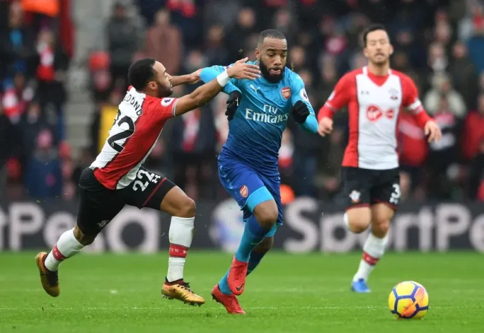 Framed Print : Clash at St. Mary's: Lacazette vs. Redmond in Southampton v Arsenal Premier League Match Framed Print : Clash at St. Mary's: Lacazette vs. Redmond in Southampton v Arsenal Premier League Match