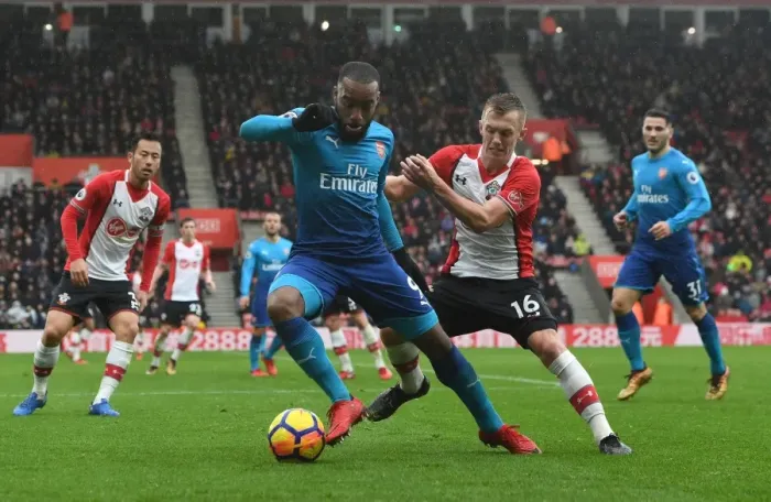 Framed Print : Clash at St. Mary's: Lacazette vs. Ward-Prowse in Southampton v Arsenal Premier League Showdown Framed Print : Clash at St. Mary's: Lacazette vs. Ward-Prowse in Southampton v Arsenal Premier League Showdown