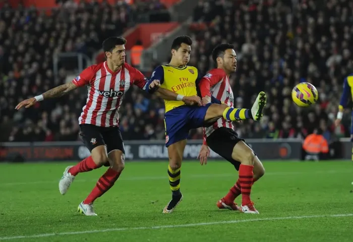 Framed Print : Clash at St. Mary's: Sanchez Faces Off Against Southampton Defenders