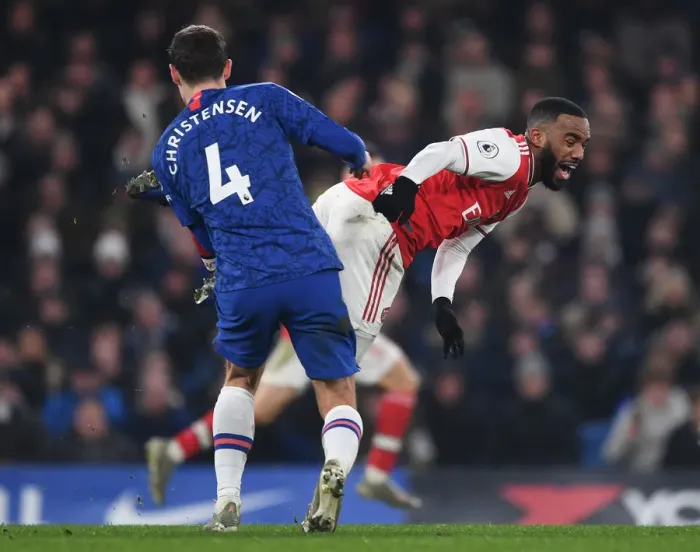 Framed Print : Clash at Stamford Bridge: Lacazette Fouls by Christensen in Premier League Showdown (Chelsea v Arsenal 2019-20) Framed Print : Clash at Stamford Bridge: Lacazette Fouls by Christensen in Premier League Showdown (Chelsea v Arsenal 2019-20)