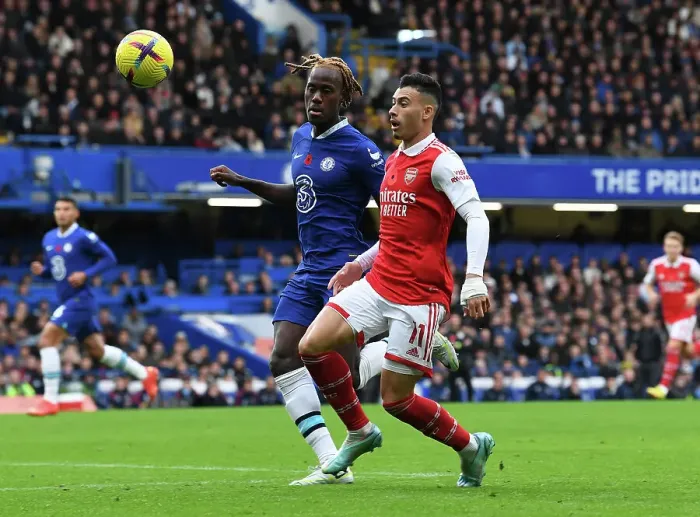 Framed Print : Clash at Stamford Bridge: Gabriel Martinelli vs. Trevoh Chalobah - Chelsea vs. Arsenal, Premier League 2022-23