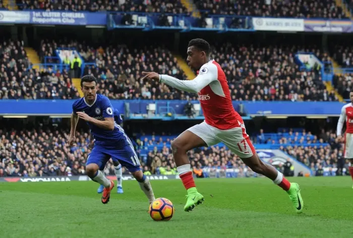 Framed Print : Clash at Stamford Bridge: Pedro Halts Iwobi's Advance - Premier League 2016-17 Framed Print : Clash at Stamford Bridge: Pedro Halts Iwobi's Advance - Premier League 2016-17