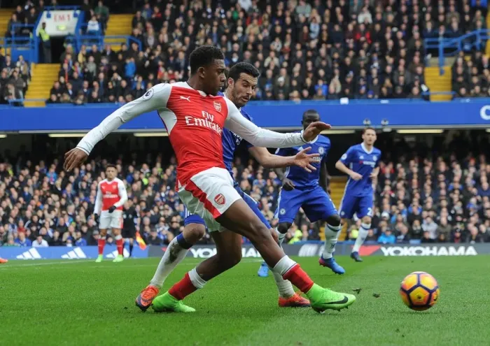 Framed Print : Clash at Stamford Bridge: Pedro Halts Iwobi's Charge in Intense Chelsea vs. Arsenal Premier League Showdown Framed Print : Clash at Stamford Bridge: Pedro Halts Iwobi's Charge in Intense Chelsea vs. Arsenal Premier League Showdown