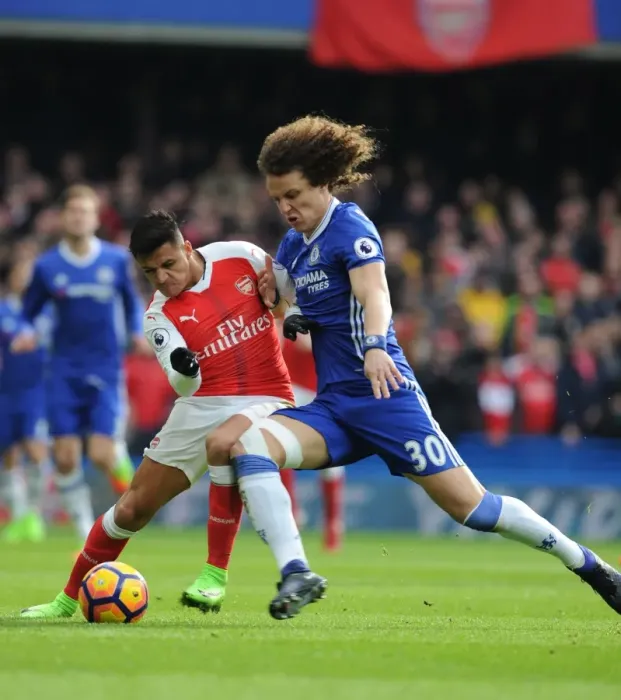 Framed Print : Clash at Stamford Bridge: Sanchez vs. Luiz - Premier League Showdown between Chelsea and Arsenal Framed Print : Clash at Stamford Bridge: Sanchez vs. Luiz - Premier League Showdown between Chelsea and Arsenal