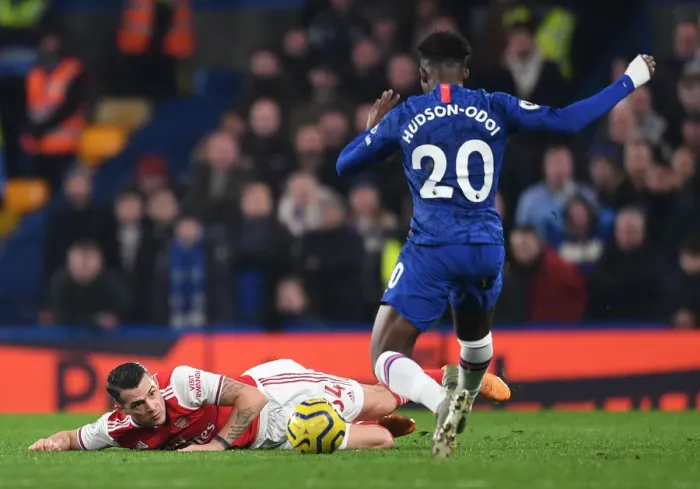 Framed Print : Clash at Stamford Bridge: Xhaka vs Hudson-Odoi in Premier League Showdown