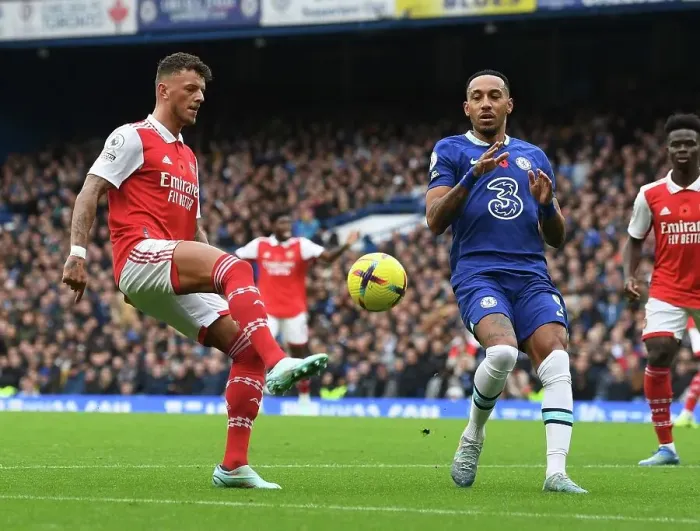 Framed Print : Clash of Stars: Aubameyang vs. White - Premier League 2022-23: Battle at Stamford Bridge (Chelsea vs. Arsenal)
