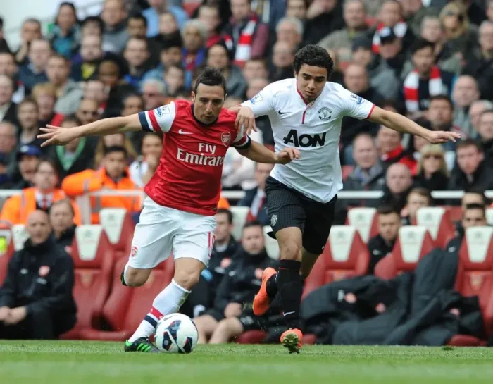 Framed Print : Clash of Stars: Cazorla vs. Rafael in Arsenal vs. Manchester United Showdown