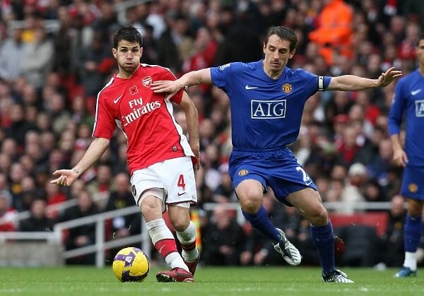 Clash of Stars: Fabregas vs. Neville in Arsenal's 2-1 Victory over Manchester United