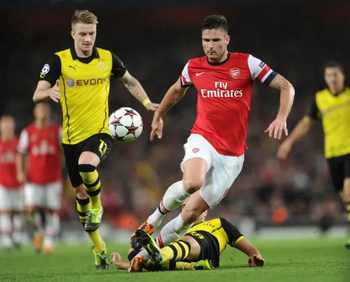 Framed Print : Clash of Stars: Giroud vs. Reus & Sahin - Arsenal vs. Borussia Dortmund (2013-14) Framed Print : Clash of Stars: Giroud vs. Reus & Sahin - Arsenal vs. Borussia Dortmund (2013-14)