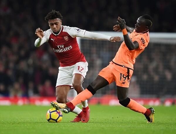 Clash of Stars: Iwobi vs. Mane in Arsenal vs. Liverpool Showdown