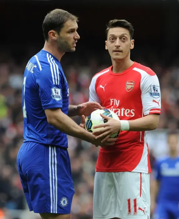 Framed Print : Clash of the Stars: Mesut Ozil vs. Branislav Ivanovic (Arsenal vs. Chelsea, 2015)