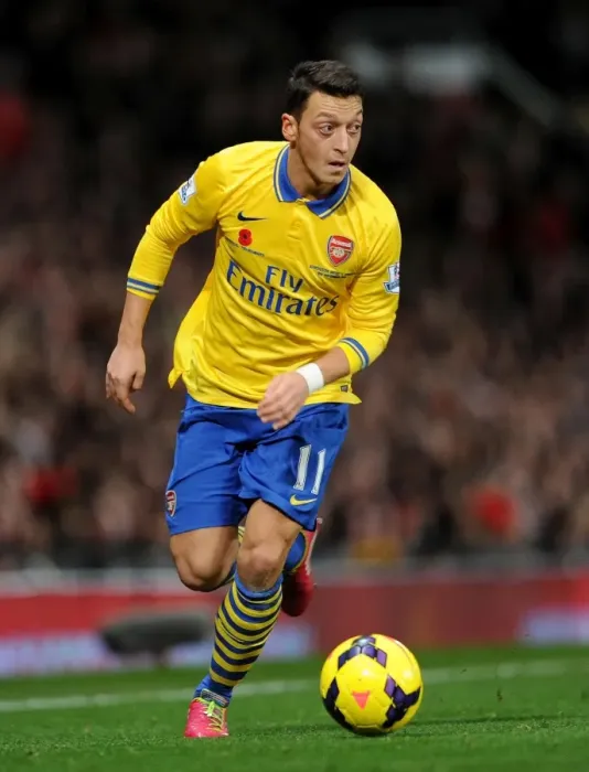 Framed Print : Clash of the Stars: Mesut Ozil vs Manchester United (2013-14)