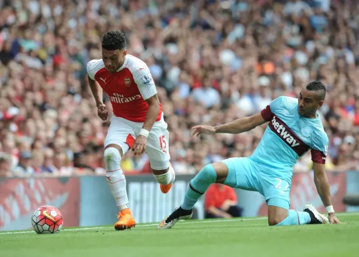 Framed Print : Clash of Stars: Oxlade-Chamberlain vs. Payet in Premier League Battle