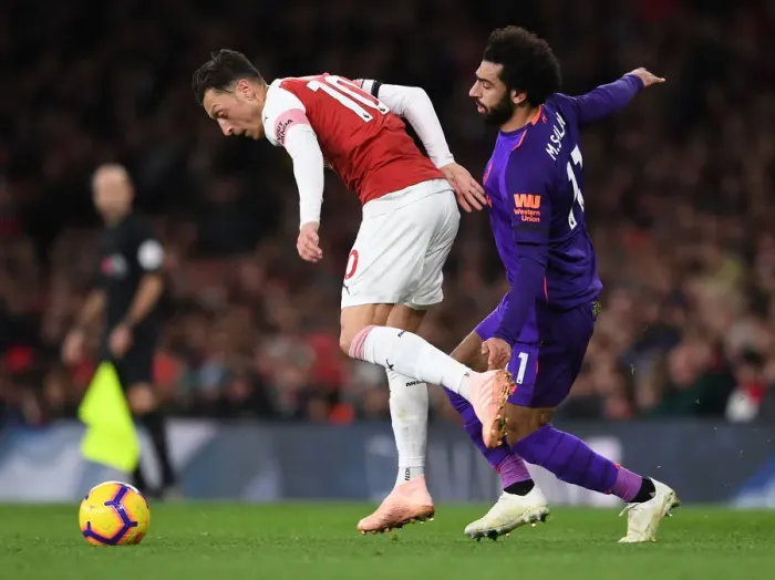 Framed Print : Clash of Stars: Ozil vs. Salah - Arsenal vs. Liverpool, Premier League 2018-19 Framed Print : Clash of Stars: Ozil vs. Salah - Arsenal vs. Liverpool, Premier League 2018-19