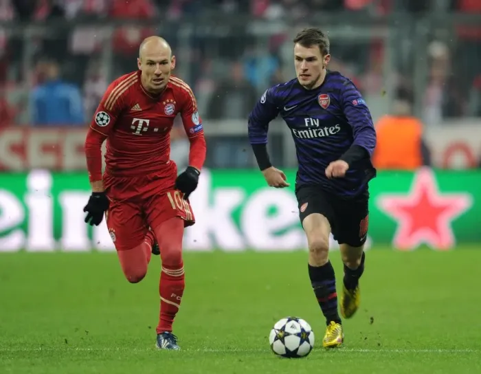 Framed Print : Clash of Stars: Ramsey vs. Robben - UEFA Champions League 2013: Arsenal's Ramsey Goes Head-to-Head with Bayern's Robben Framed Print : Clash of Stars: Ramsey vs. Robben - UEFA Champions League 2013: Arsenal's Ramsey Goes Head-to-Head with Bayern's Robben