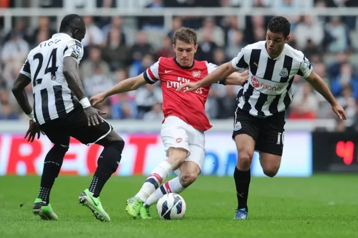 Framed Print : Clash of Stars: Ramsey vs Ben Arfa, Tiote - Newcastle United vs Arsenal (2012-13)