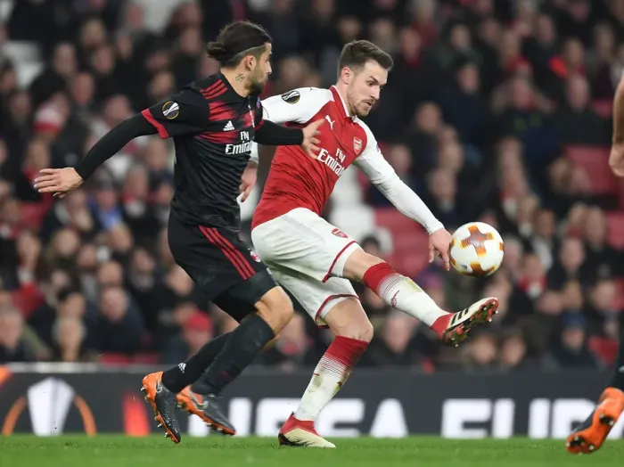 Framed Print : Clash of Stars: Ramsey vs. Rodriguez in Arsenal vs. AC Milan Europa League Showdown Framed Print : Clash of Stars: Ramsey vs. Rodriguez in Arsenal vs. AC Milan Europa League Showdown