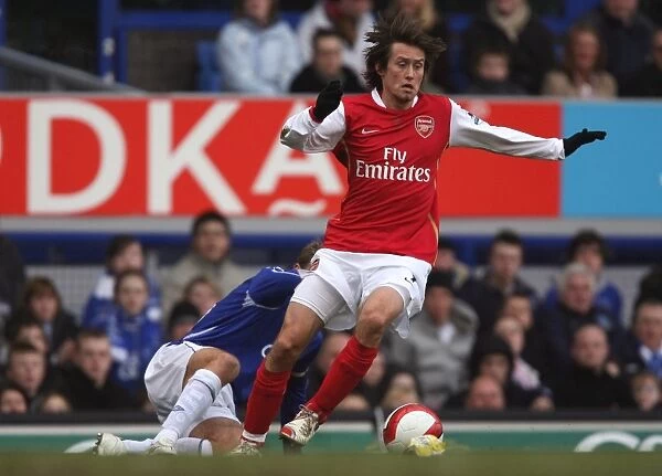 Clash of Stars: Rosicky vs. Neville in the Intense Rivalry of Everton vs. Arsenal, Barclays Premiership, 2007