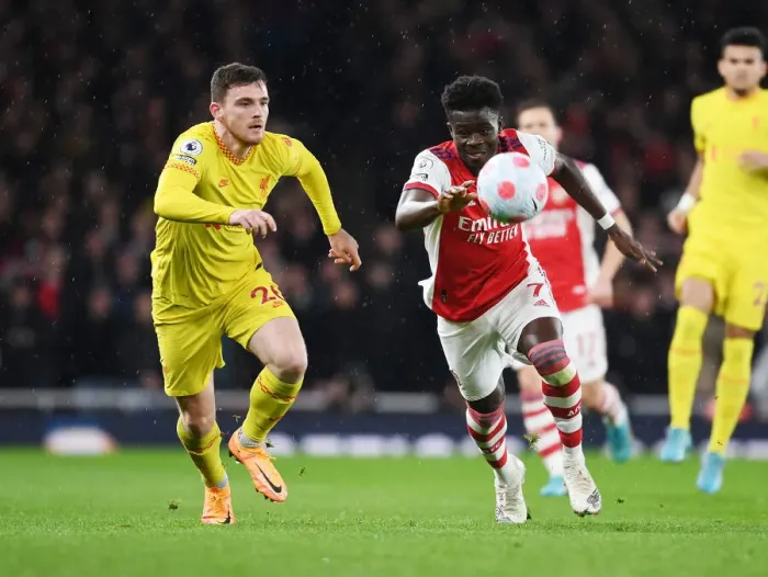 Framed Print : Clash of the Stars: Saka vs. Robertson - Arsenal vs. Liverpool at Emirates Stadium
