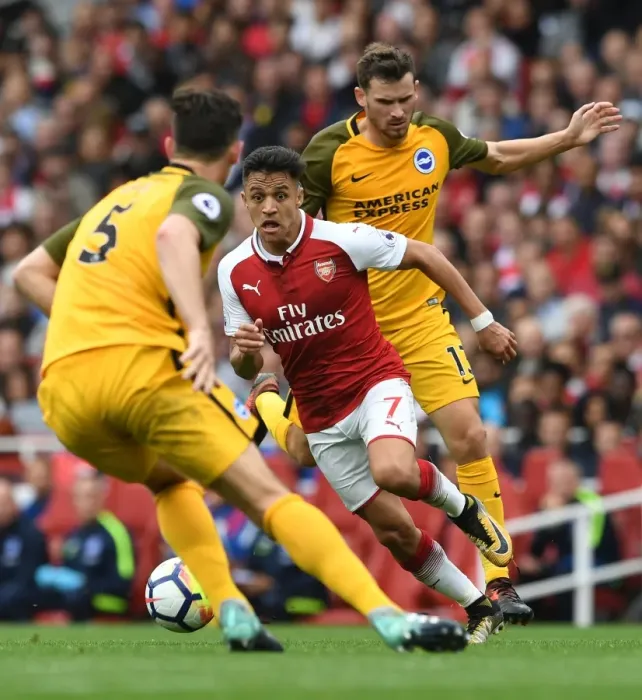 Framed Print : Clash of Stars: Sanchez vs. Gross - Arsenal's Battle Against Brighton Framed Print : Clash of Stars: Sanchez vs. Gross - Arsenal's Battle Against Brighton