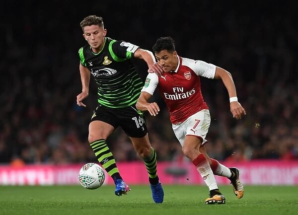 Clash of Stars: Sanchez vs. Houghton in Arsenal's Carabao Cup Battle