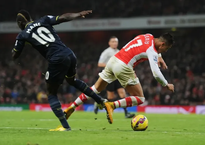 Framed Print : Clash of Stars: Sanchez vs Mane - Intense Arsenal Rivalry (2014-15)