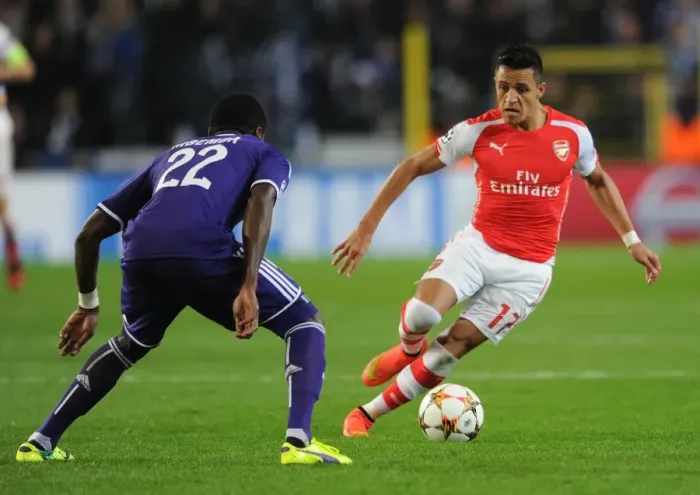 Framed Print : Clash of Stars: Sanchez vs. Mbemba in the UEFA Champions League