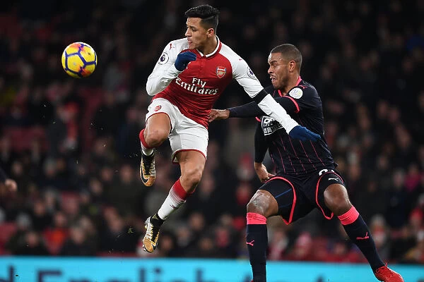 Clash of Stars: Sanchez vs Mounie in Arsenal's Battle against Huddersfield