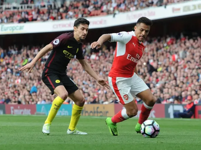 Framed Print : Clash of Stars: Sanchez vs. Navas in Arsenal vs. Manchester City Showdown